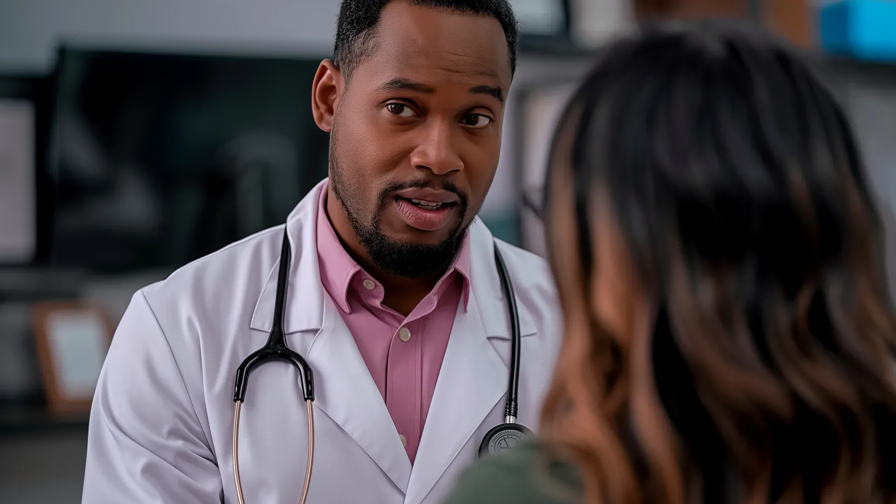 A clinician and patient examining unfamiliar readings, representing the moment a private bodily change enters a system of expertise and authority.
