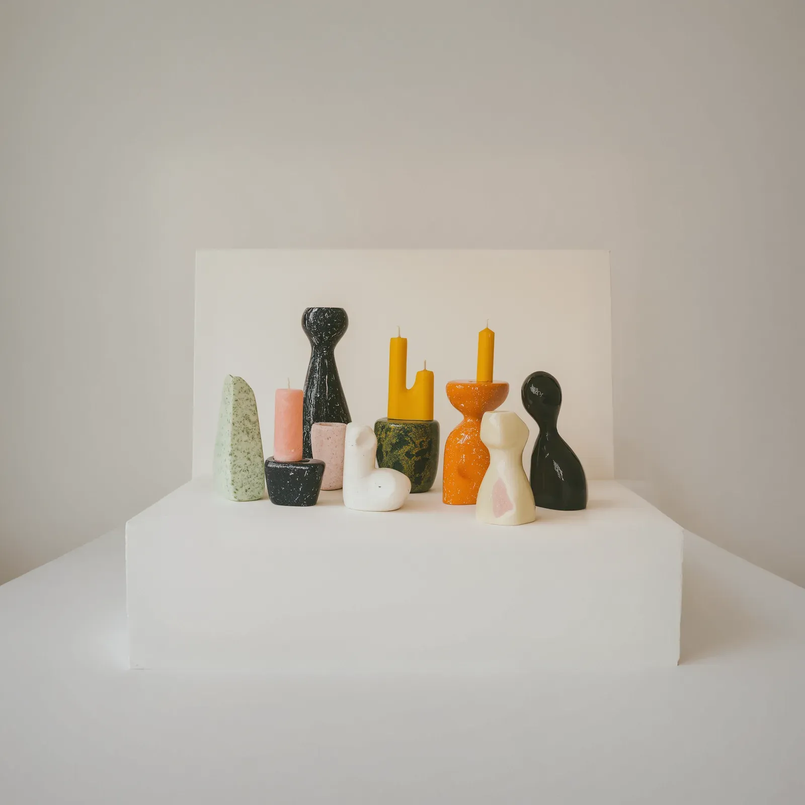 An arrangement of contrasting human forms, a visual reminder that emotional complexity comes from distinct pressures held together.
