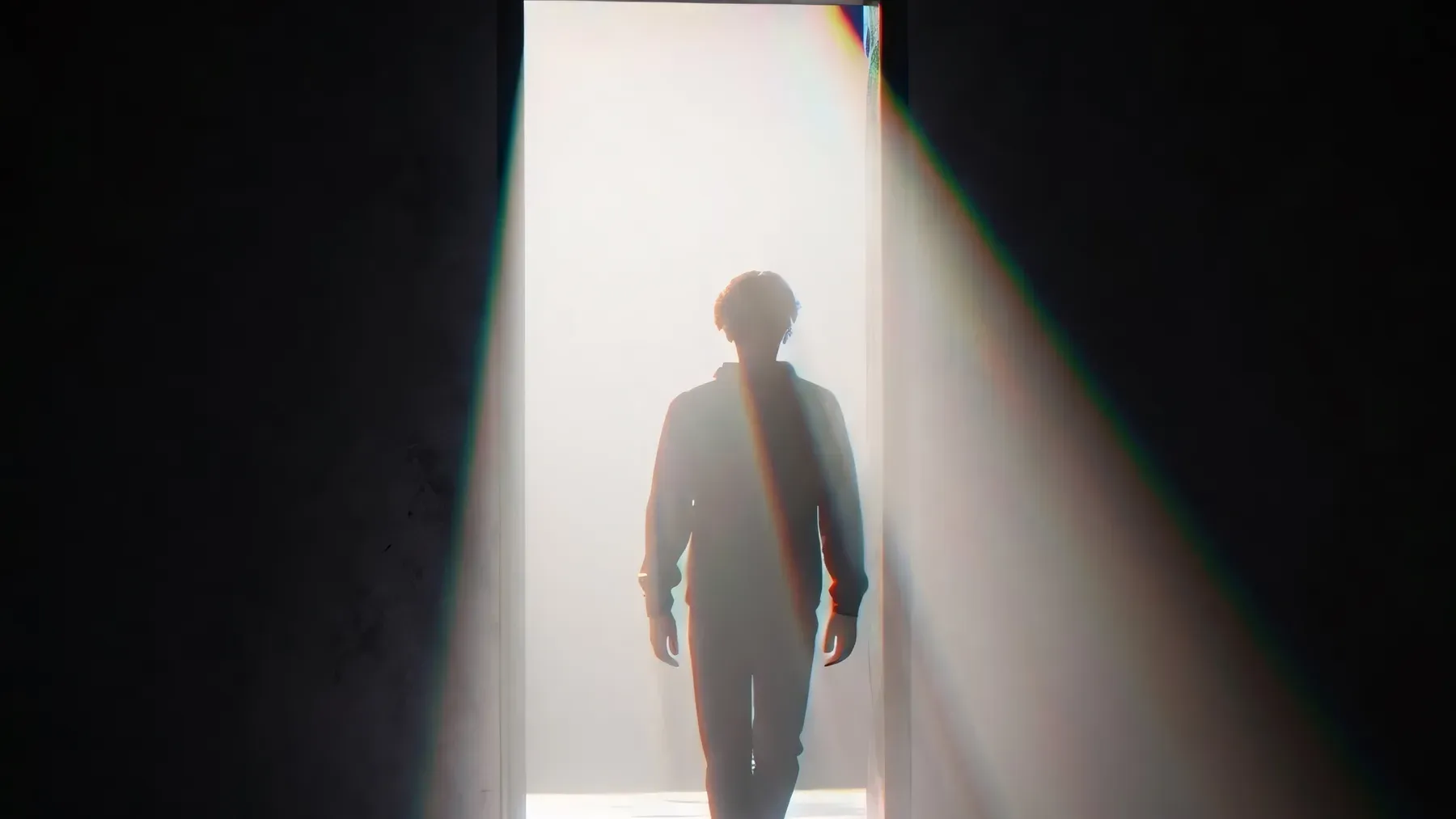 A figure crossing a bright doorway visualizes the clear boundary and reorientation required for a deliberate viewpoint change.