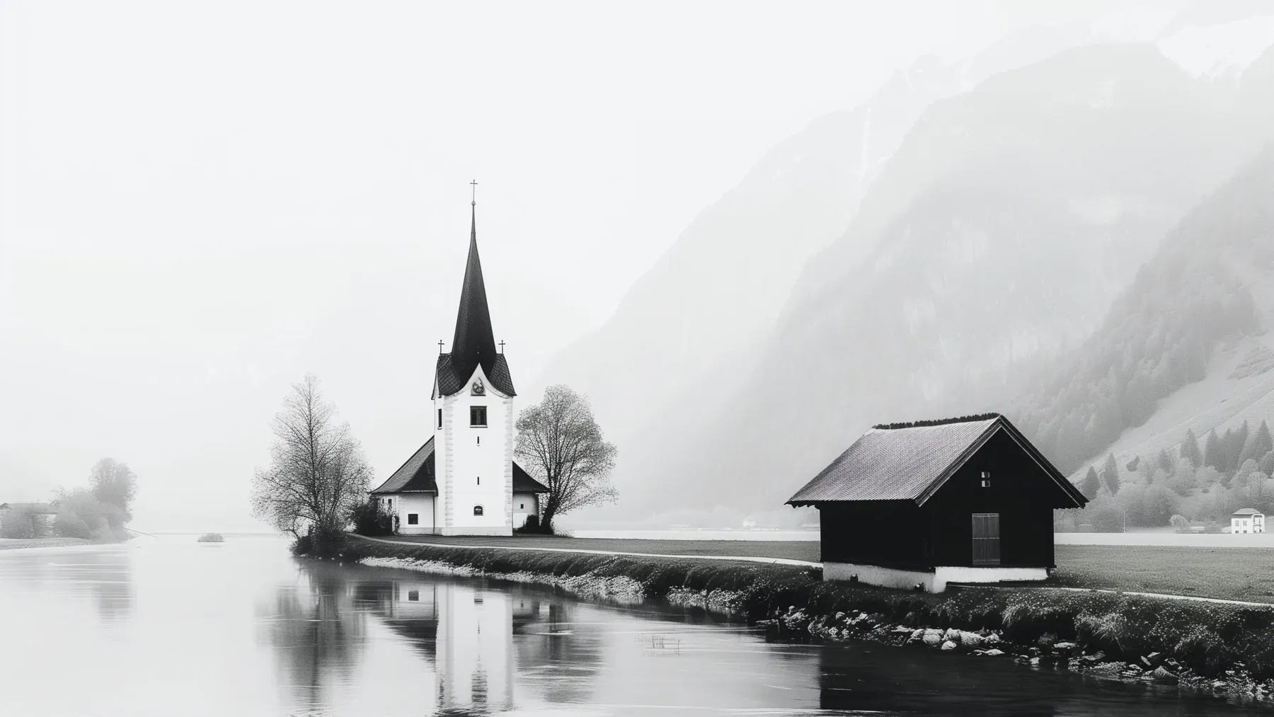 A church and scattered buildings held between water and mountains, evoking a community whose institutions, beliefs, and survival are inseparable from place.