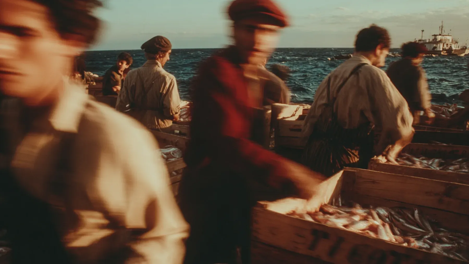 Harbor workers sort the day's catch together, showing how ordinary labor creates a lived claim on a place over time.