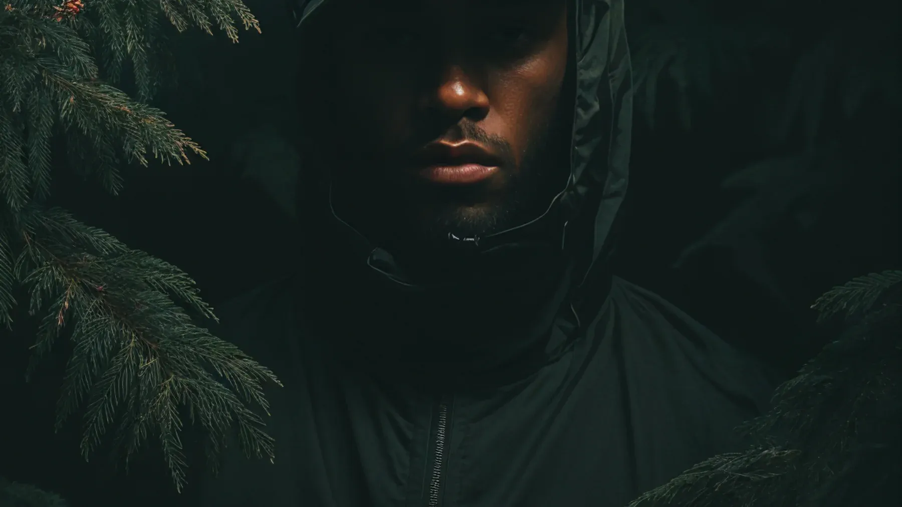 A concealed figure watching through dense foliage suggests an approach governed by patience, partial visibility, and the need to remain unseen.