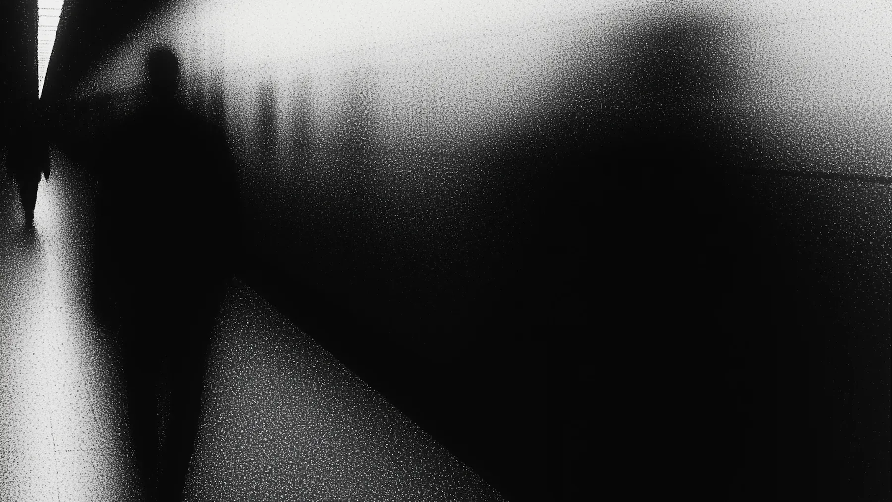 Blurred figures moving through a corridor, an image of the brief disorientation a chapter boundary must resolve as one viewpoint gives way to another.
