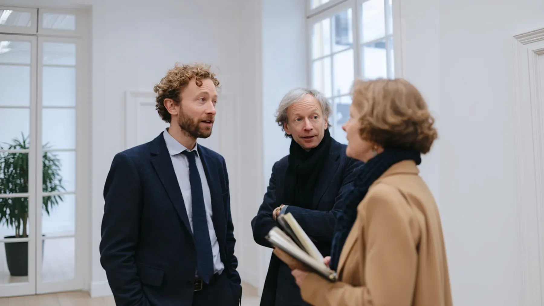Three professionals in conversation, where status, prior behavior, and practical authority determine what a refusal may cost.