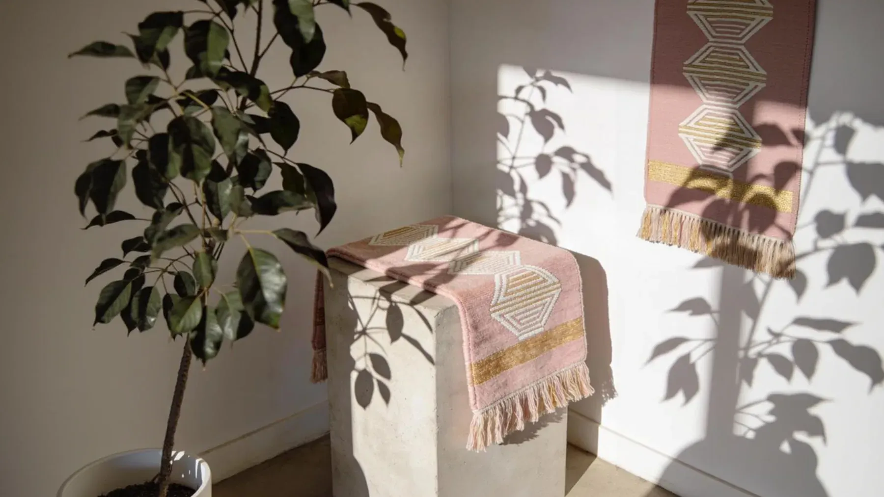 A finished textile displayed in changing light, where a visible variation can be classified as failure, evidence of process, or intentional design.