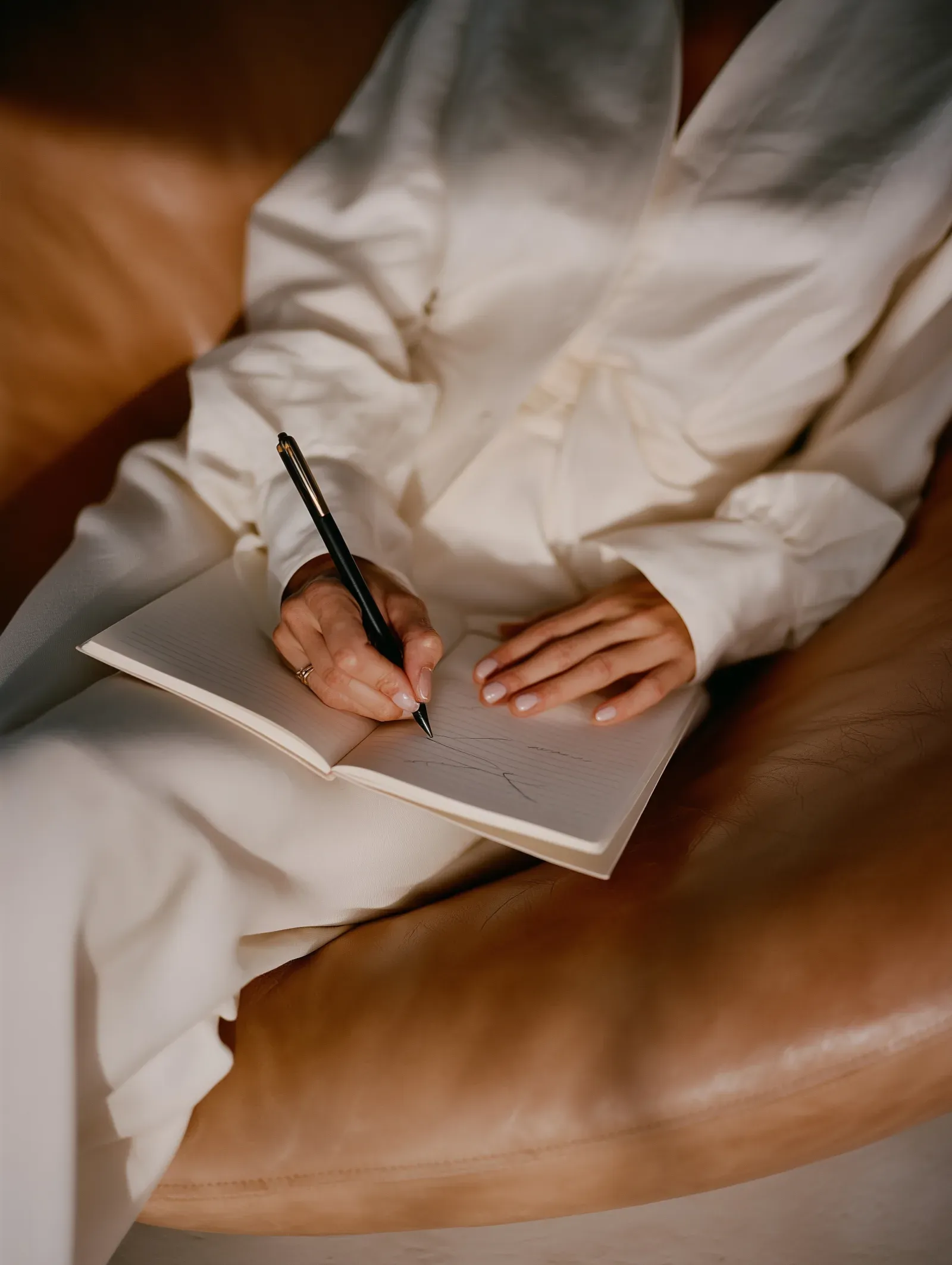 A writer making focused revision notes before changing the manuscript, keeping each scene connected to what follows.