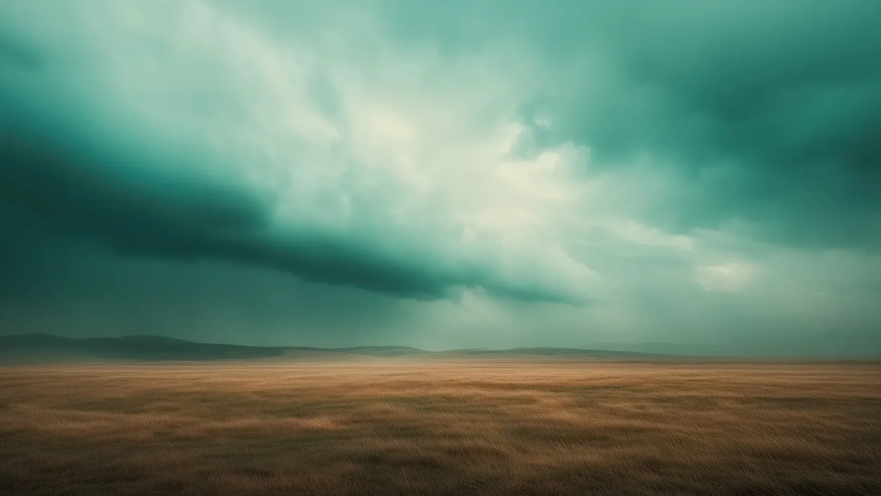A storm front crossing dry grassland, showing how weather becomes a schedule of escalating ranch decisions.